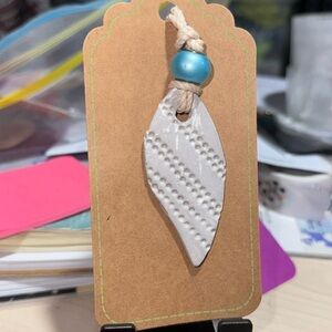 Feather clay necklace 2‎ 1/2” long NEW handmade stamped